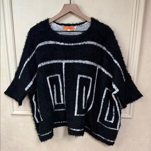 One A Black and White Geometric Sweater